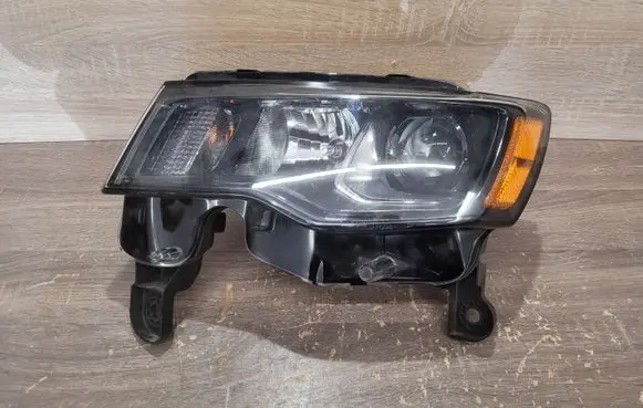 Jeep Grand Cherokee Headlight/headlamp 68289235AD 337091 T77624B