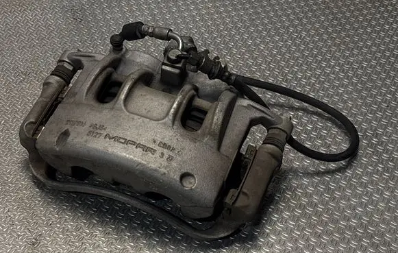 Jeep Grand Cherokee WL Front brake caliper 21193M
