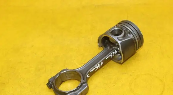 Opel Corsa D Piston with connecting rod 73502643
