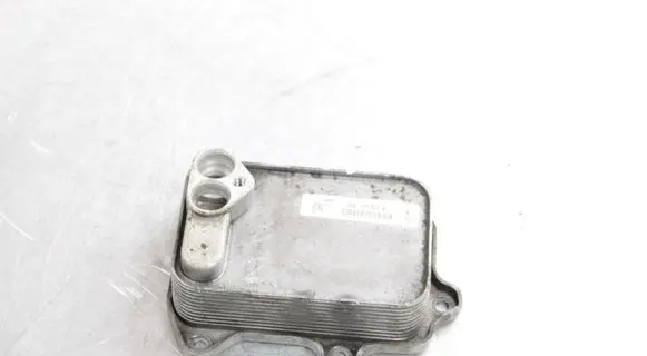 Volkswagen Tiguan Engine oil radiator 03C117021J