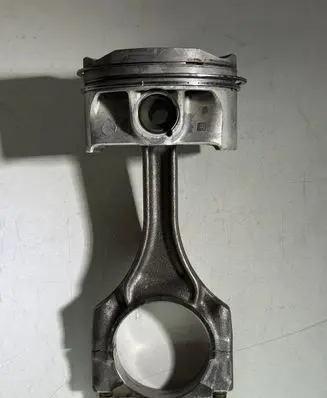 Piston with connecting rod