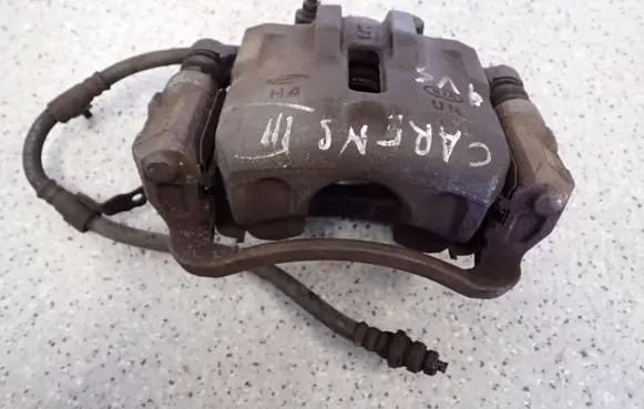 KIA Carens II Front brake caliper