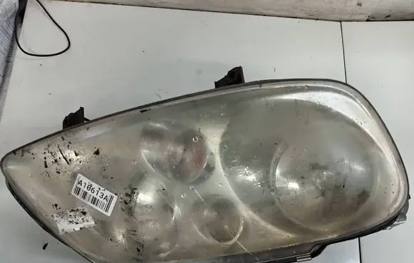 Volkswagen Touran I Headlight/headlamp 01930844