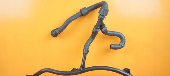 Volkswagen Golf VII Engine coolant pipe/hose 04E121070L CXS