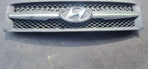 Hyundai Tucson JM Front bumper upper radiator grill