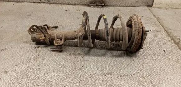 KIA Carens II Front shock absorber with coil spring 