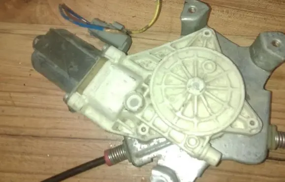 Nissan Micra Front door window regulator motor