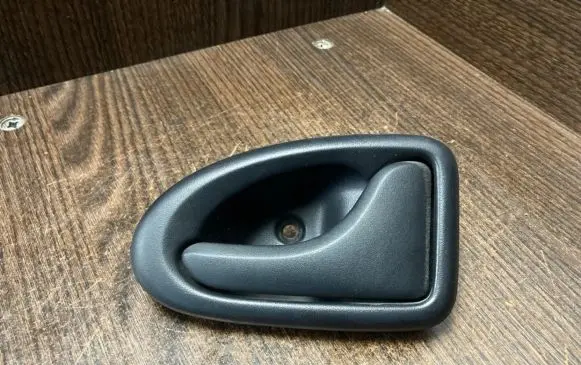 Iveco Daily 3rd gen Front door interior handle 7700830079