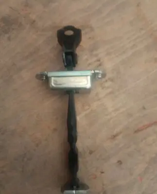 Nissan Pulsar Front door check strap stopper