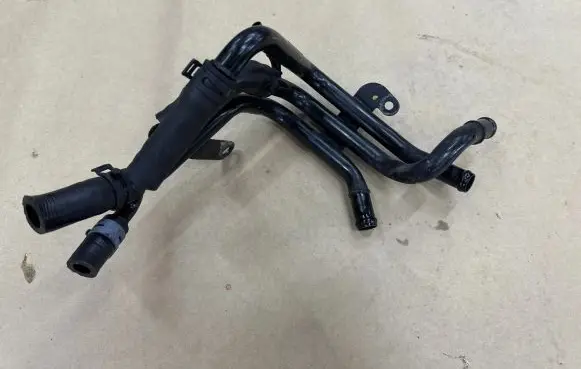Volkswagen Golf VII Engine coolant pipe/hose 04L121064E