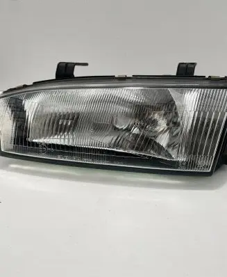 Subaru Legacy Headlight/headlamp 10020580 010066