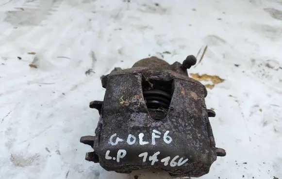 Volkswagen Golf VI Front brake caliper
