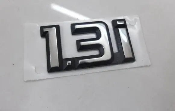 Nissan Almera N16 Manufacturer badge logo/emblem 63890-6F600