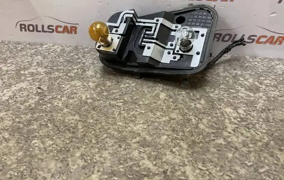 Volkswagen Touareg I Tail light bulb cover holder 7L6945258