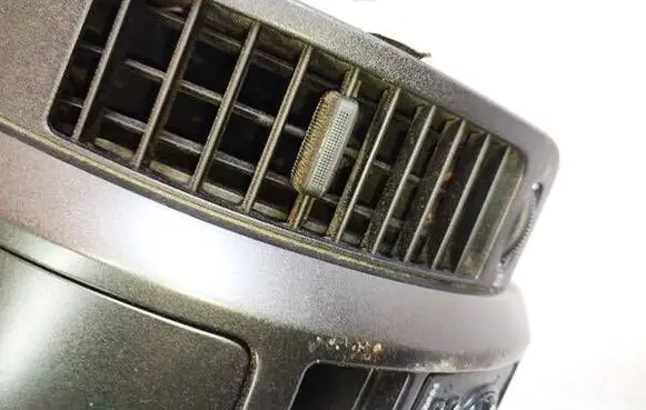 Nissan Note (E11) Dash center air vent grill PG05687509U003 P19650A2770077