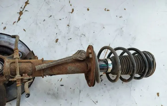 Toyota Yaris Front shock absorber with coil spring