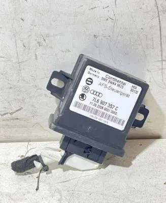 Volkswagen Touareg I Light module LCM 7L6907357C 5WK49675