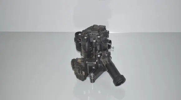 Thermostat/thermostat housing