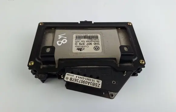 Volkswagen PASSAT B5 ABS control unit/module 1H0907379D