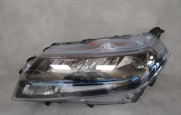 Suzuki Grand Vitara II Headlight/headlamp 1007R016 74S00 25022021