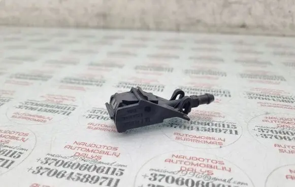Windshield washer spray nozzle