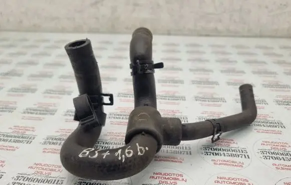Volkswagen PASSAT B5.5 Engine coolant pipe/hose 06B121058BA 06B121058