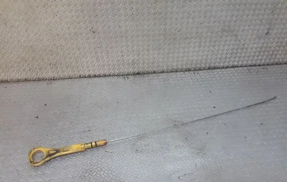 Oil level dip stick