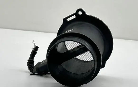 Volkswagen Touareg I Mass air flow meter 1J0973705 4099