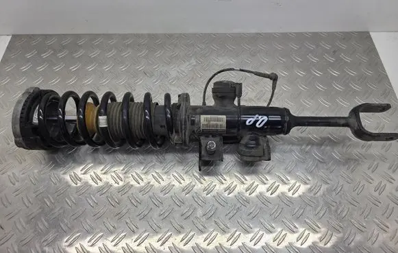 Front shock absorber with coil spring
