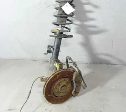 Front shock absorber with coil spring
