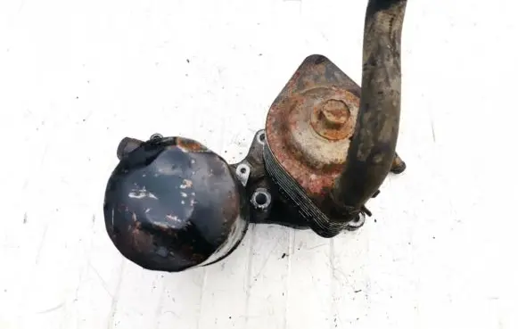 Mazda 323 Oil filter mounting bracket