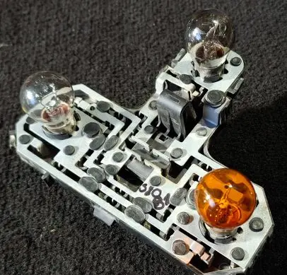 Volvo S80 Tail light bulb cover holder
