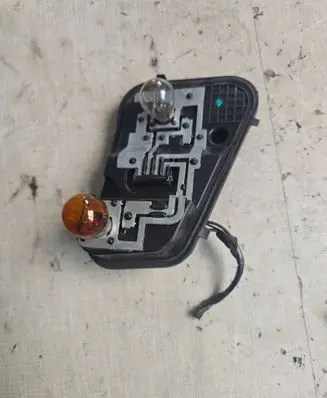 Volkswagen Touareg I Tail light bulb cover holder 7L6945257