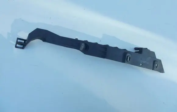 Opel Astra J Headlight/headlamp mounting bracket 13287640