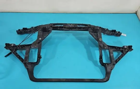 Radiator support slam panel