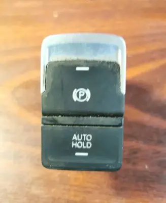 Volkswagen Golf VII Hand parking brake switch 560927225D