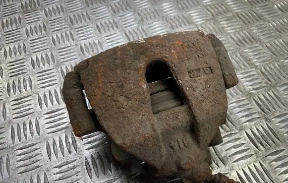 Mazda 3 II Front brake caliper
