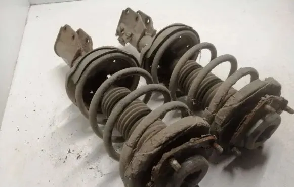 Mazda Premacy Front shock absorber with coil spring