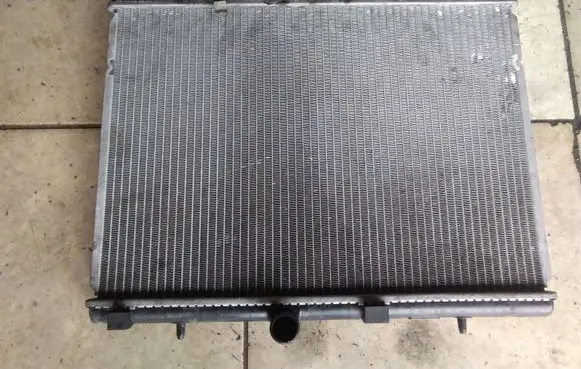 Citroen C4 I Coolant radiator 99001213 8MK376700234