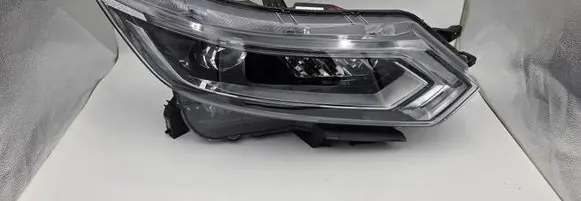 Nissan Qashqai Headlight/headlamp 10019011 N118
