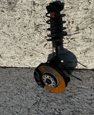 Front wheel hub spindle knuckle