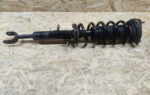 Infiniti G35 Front shock absorber with coil spring 56110AM803