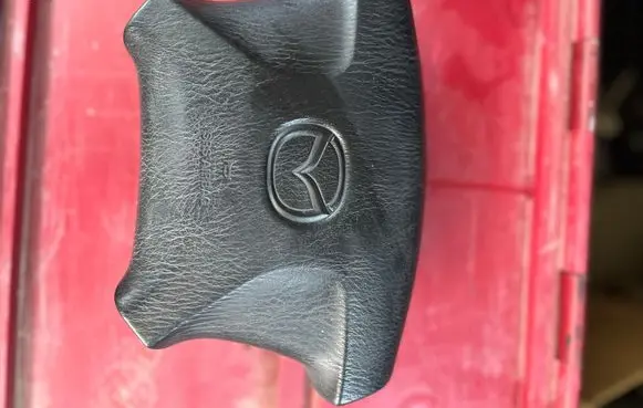 Steering wheel airbag