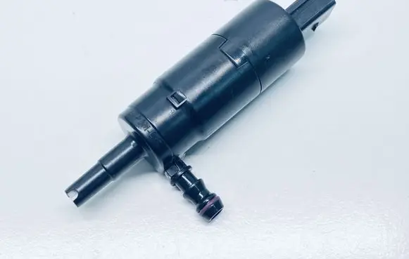 Volkswagen Touareg II Headlight washer pump 3B7955681