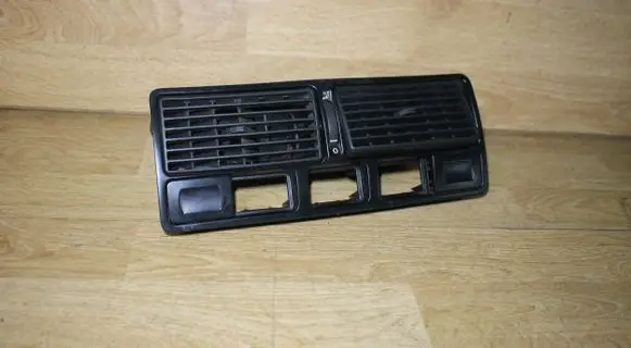 Volkswagen Golf IV Dash center air vent grill 1J0819736C