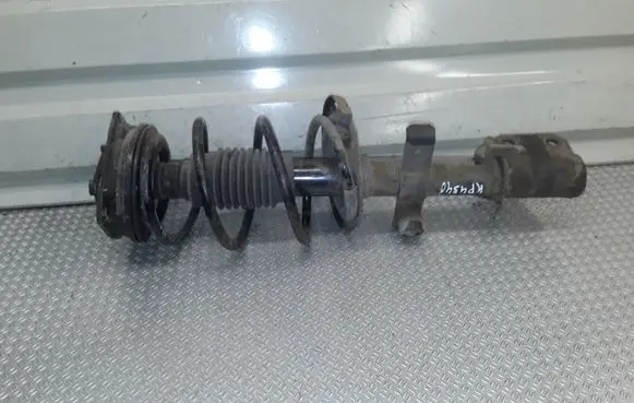 Renault Clio III Front shock absorber with coil spring 