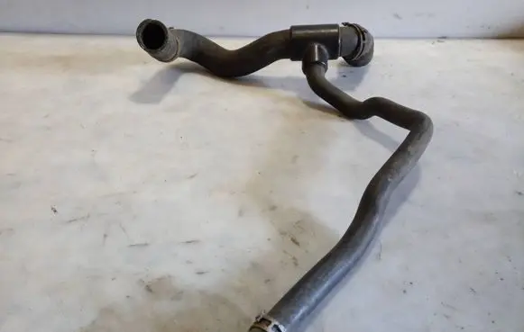 Opel Corsa D Engine coolant pipe/hose 643293970 13191210