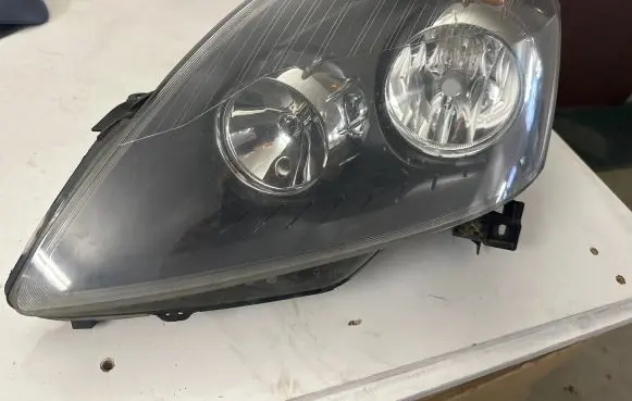 Opel Zafira B Headlight/headlamp 13252472 0301214201