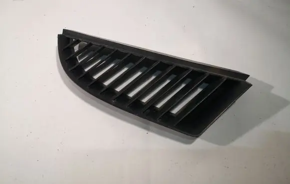 Mitsubishi Colt Front bumper upper radiator grill 127774