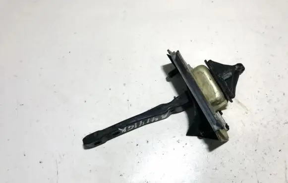 Mazda 323 F Rear door check strap stopper
